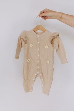 Spring Fitted Bubble Romper For Playdate, Fitted Bubble Romper For Spring Playdate, Fitted Bubble Romper For Playdate In Spring, Cute Beige Bubble Romper For Spring, Spring Ruffled Onesie For Loungewear, Spring Beige Bubble Romper With Ruffles, Spring Loungewear Onesie With Ruffles, Spring Onesie For Playdate, Long Sleeve Cream Onesie For Spring