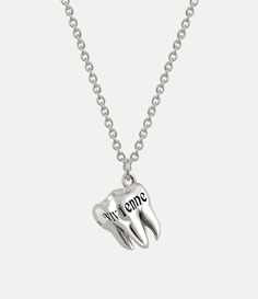 Our Rima pendant necklace is a nod to our longstanding tradition of teeth-inspired jewellery, tracing back to the iconic Spring-Summer 1997 ‘Vive La Bagatelle’ collection. Crafted with a polished plating finish, this pendant features intricate detailing on the tooth head, complete with the house's signature in black patina. It hangs elegantly from a trace chain and is secured with a lobster clasp closure, accompanied by an engraved oval tag. English Memes, Ring Watch, Design Silver, Lace Boots, Black Enamel, Primavera Estate, Vivienne Westwood, Cute Jewelry, Lace Up Shoes