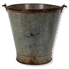 an old metal bucket with rivets on the sides