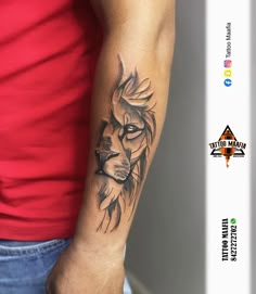 a man's arm with a lion tattoo on the left side of his arm