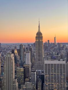 the skyline of new york city at sunset