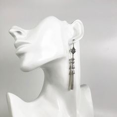 925 Sterling Silver Handmade Artisan Crafted Filigree Dangle Drop Tassel Earrings Material: 925 Solid Sterling Silver, 925 Stamped Earrings Length: 3.30 inches Width: 0.35 inches Finishing: Oxidized and Polished Comes with a gift pouch and box Free Domestic Shipping We hope that you enjoy our exclusive artisan handcrafted jewelry. Elegant Silver Long Drop Tassel Earrings, Elegant Metal Tassel Earrings, Elegant Silver Earrings With Tassels, Elegant Dangle Tassel Jewelry, Elegant Metal Jewelry With Tassels, Elegant Silver Tassel Earrings For Party, Elegant Metal Tassel Jewelry, Adjustable Silver Tassel Earrings For Party, Elegant Metal Dangle Tassel Earrings