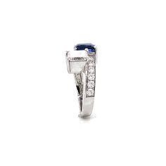 This Gemini twin inspired ring is crowned with a Ceylon blue sapphire 2.17 ct in emerald cut. It is mirrored by a white diamond 1.06 ct also in emerald cut, in G-H Color Clarity VS. Both pair of stones are GIA certified. Smaller round natural white diamonds 0.65 ct as accents. Platinum 950 metal. Length: 1.1 cm Width: 1.0 cm Weight: 7.1 g [shortcode] [video] [/video] [/shortcode] Diamond Chandelier, White Gold Hoop Earrings, Platinum Bracelet, Ceylon Blue Sapphire, White Gold Hoops, Platinum Earrings, Platinum Diamond Rings, Ceylon Sapphire, 18k Gold Jewelry