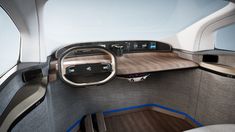 the interior of an electric vehicle with wood paneling