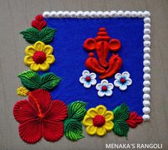 a colorful piece of cloth with flowers and an elephant on it