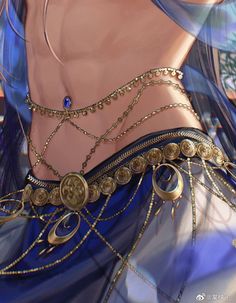 a close up of a woman's torso with chains and jewelry around her waist