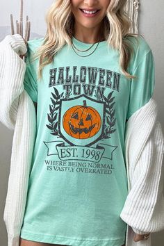 HALLOWEEN TOWN WHERE BEING NORMAL IS VASTLY OVERRATED UNISEX SHORT SLEEVE,GRAPHIC TEE,GRAPHIC TSHIRTS,TSHIRTS,TEES100%COTTON,HEATHER(52%COTTON,48%POLY),ATH.HEATHER,BLACK HEATHER(90%COTTON,572%POLY)NICARAGUAMade In: Nicaragua Being Normal Is Vastly Overrated, Boutique Style Outfits, Plus Size Boutique, Graphic Design Print, Jean Top, Halloween Town, Tee Dress, Unisex Shorts, Heather Black