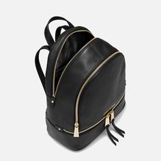 The ‘Rhea’ black leather backpack is an exquisite piece from MICHAEL Michael Kors. It's elegantly fashioned from grained leather and accentuated with delicate gold-tone hardware. Michael Kors Rucksack, Men's Totes, Medium Backpack, Black Leather Backpack, Handbags Michael Kors, Michael Kors Black, Black Backpack, Michael Kors Bag