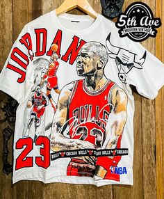 #michaeljordan #basketball #nba #tshirt #tee #streetwear #vintagereprint #y2k #shopvintage #thrift #thriftshop #90sstyle #vintageclothing #vintaget #bootleg Fan Apparel Tops With Character Print For Sports Events, Band Merch Tops With Custom Artwork, Graphic Tee Tops With Custom Artwork For Fans, Crew Neck Tops With Character Print For Sports Events, Custom Artwork Crew Neck Top For Fan Merchandise, Crew Neck Tops With Custom Artwork For Fan Merchandise, Band Merch Tops With Custom Artwork For Streetwear, Graphic Tee T-shirt For Basketball With Graphic Print, Graphic Print T-shirt For Basketball