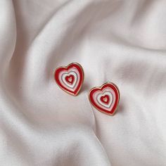 Don't miss out on this beautiful gold plated and pink retro heart stud earrings. They work with a large variety of looks and add a bit of sparkle to your outfit. MORE jewellery pieces avaliable on our shop! Any questions please message we are happy to help. Free postage in UK Thank you for shopping with us Heather&Bumble 📪Follow us at: Instagram: heatherandbumble Twitter: Heather_Bumble Pintrest: Heather & Bumble Pink & Gold Retro Heart Stud Earrings -  Pink 70's Style Earrings,Vintage Style,Pink Jewellery,Gold Earrings,Gold Heart Stud Earrings Heart-shaped Clip-on Earrings For Valentine's Day, Heart-shaped Clip-on Earrings For Valentine's Day Anniversary, Valentine's Day Heart Shaped Clip-on Earrings For Anniversary, Valentine's Day Heart Shaped Clip-on Earrings, Retro White Earrings For Gift, White Pierced Heart Earrings For Valentine's Day, White Pierced Earrings For Valentine's Day, White Heart Pendant Earrings For Valentine's Day, Retro Heart-shaped Jewelry Gift