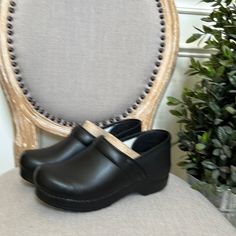 Brand New, Never Worn. Don’t Have The Box Though. Size 38 Black Dansko Clogs Outfit, Classic Black Synthetic Clogs, Classic Black Clogs With Reinforced Heel, Classic Black Clogs With Cushioned Footbed, Non-slip Round Toe Clogs For Work, Black Clogs With Wooden Heel For Work, Black Workwear Clogs With Wooden Heel, Black Clogs With Cushioned Footbed And Round Toe, Black Closed Toe Clogs With Cushioned Footbed