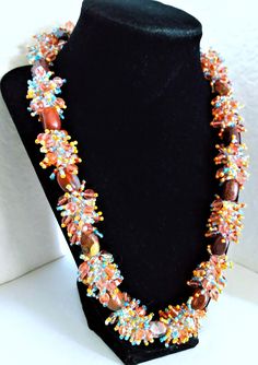 A handmade glass beaded necklace that is perfect for any occasion: parties, holidays, birthdays, anniversaries. All products are hand-crafted by my mother. Dimensions: - Actual Length: 24.3 cm - Collar Length: 22.0 cm - Width: 17.1 cm - Height: 2.0 cm Lightweight, high quality with a beaded hook as a clasp. Will respond to concerns and suggestions promptly. Acrylic Gems: 1.2 cm. Shipping costs: Free Domestic Shipping. All orders are sent by air-mail with tracking number. Time of delivery: Estimated 1-3 days for domestic shipping; international make take 7-14 days. Feel free to check out our other similar products! Link: https://noorsjewelers.etsy.com Unique Adjustable Amber Beaded Necklace, Adjustable Hand-strung Beaded Necklace For Party, Handmade Beaded Necklaces With Round Beads For Celebration, Handmade Beaded Bracelets With Round Beads For Celebration, Unique Beaded Necklace With Large Beads As Gift, Unique Colorful Beaded Necklaces For Celebration, Oval Glass Gemstone Bead Necklaces, Glass Necklaces With Oval Gemstone Beads, Brown Beaded Jewelry Gift