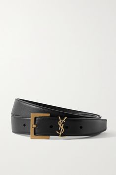 SAINT LAURENT's 'YSL' monogram was created in 1961 by the Ukrainian-French commercial poster artist Cassandre - little did he know, it would become one of the most iconic logos in fashion history. Made in Italy from supple leather, this belt is decorated with gold hardware that makes it so easy to match with any outfit or jewelry. Ysl Belt, Poster Artist, Luxury Belts, Gold Belts, Branded Belts, Designer Belt, Belt Design, Designer Belts, Saint Laurent Paris