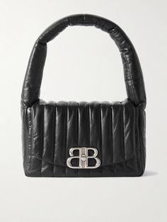 Balenciaga's 'Monaco' shoulder bag is as refined and luxurious as the sovereign city-state it's named after. Crafted in Italy from leather, it's padded and quilted for definition and accented with the house's signature 'BB' hardware at the front. Stow your phone, cardholder and sunglasses inside. Luxury Black Quilted Bag, Balenciaga Monogram Bag, Luxury Black Quilted Shoulder Bag, Balenciaga Large Bag, Balenciaga Black Bag Farfetch, Gucci Shop, Raffia Bag, City State, Quilted Leather