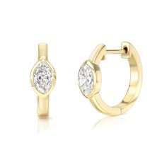 These 18K yellow gold huggies feature a bezel Marquis diamond 18K Yellow gold Diamonds: 0.41 CTW Sold as a pair Fine Jewelry Gold Huggie Earrings With Single Diamond, Gold Huggie Earrings With Single Diamond, Gold Marquise Brilliant Cut Diamond Earrings, Gold Marquise Diamond Earrings With Brilliant Cut, Gold Diamond Hoop Earrings With Bezel Setting, Formal 14k Gold Huggie Earrings With Single Diamond, Elegant Yellow Gold Huggie Earrings With Bezel Setting, Yellow Gold Bezel Setting Huggie Earrings Fine Jewelry, Luxury Yellow Gold Diamond Earrings With Bezel Setting