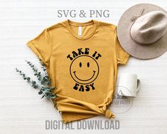 a t - shirt that says take it easy with a smiley face