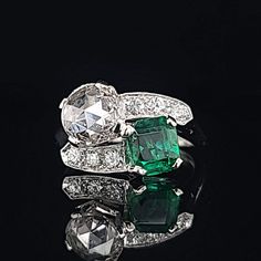 Gorgeous Vintage artdeco filigree Diamond & Emerald in Platinum toi et moi ring circ 1920's center set natural round rose cut diamond weight 0.95ct SI1-J size 6.7mm Center set natural emerald square cut weight 1.21ct size 6.2x5.6mm rich green color ,brilliant clean very lively sparkly brilliant stone. Side Set Natural Round Diamonds Weight 0.25ct. Ring size 4.5 Resizable This tremendous old vintage ring is in a very good condition. Retail value $13,500 net. Appraisal available Emerald Ring Design, Platinum Engagement Rings Vintage, Art Deco Jewelry Vintage, Filigree Engagement Ring, Vvs Diamond, Platinum Diamond Rings, Emerald Diamond Ring, Rich Green, Platinum Engagement Rings