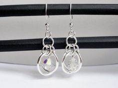 Chainmaille earrings - sputnik earrings - illusion earrings - crystal earrings - silver chainmaille Sputnik Earrings, Crystal Earrings Diy, Illusion Earrings, Saturn Ring, Chainmaille Earrings, Wire Wrap Jewelry Designs, Diy Jewelry Earrings, Earring Kit, Aluminum Jewelry