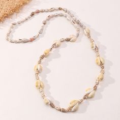 SPECIFICATIONS Fine or Fashion: Fashion Element: Puka Shell Puka Shell Necklace, Puka Shell, Beach Vacations, Memorial Necklace, Sweater Chain, Holiday Style, Shell Necklace, Beach Holiday, Shell Necklaces