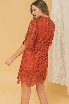 A semi-sheer shift dress featuring floral lace, a high neck with embroidered trim, short bell sleeves, scalloped hem, back keyhole with button loop closure, and woven lining Details - Self: 100% polyester Lining: 97% polyester, 3% spandex Exclusive of decoration - Imported Size & Fit - Model is 5`9" and wearing size Small - Measurements taken from size Small - Length: 33" THIS ITEM IS ON FINAL SALE AND CANNOT BE RETURNED OR EXCHANGED. Short Bell Sleeves, Embroidered Trim, Rust Dress, Vintage Inspired Design, Red Mini Dress, Scalloped Hem, Lace Design, Floral Lace, Shift Dress