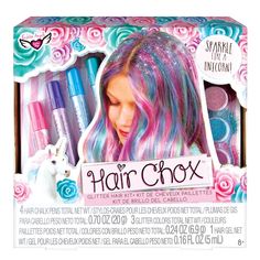 the box is filled with different colored hair and makeup items, including an unicorn - shaped pony