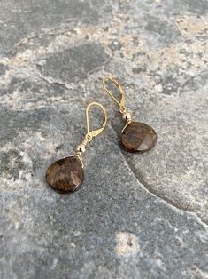 "Beautiful metallic golden brown bronzite drop dangle earrings are available in gold filled or sterling silver.  These minimalist, simple earrings are accented with smooth metal beads and finished with lever backs for a secure wear.   The earrings measure approx 1.25\" from end to end.  The bronzite teardrops are approx 10mm. You may also like to check out more of my bronzite jewerly here: https://etsy.me/3yCijSN You may also like to check out more of my earrings here: http://etsy.me/2oDJlWy Fre Cheap Bronze Drop Earrings, Cheap Bronze Earrings, Cheap Bronze Jewelry Gift, Cheap Bronze Jewelry For Gift, Dangle Earrings Gold, Brown Gemstone, Earrings Everyday, Castle Rock, Drop Dangle Earrings