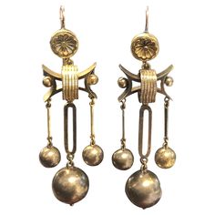 Circa 1880s High Style Victorian, Etruscan Revival Yellow Gold Earrings, measuring 2 3/4 inches in length X 3/4 inch wide. Showing some signs of 100 years of Patina and Tarnish and a small ding on the back side of one of the large ball drops. Ball Drop, Yellow Gold Earrings, Yellow Gold Earring, 100 Years, Jewelry Earrings Dangle, Gold Earrings, Patina, 4 Inch, Dangle Earrings