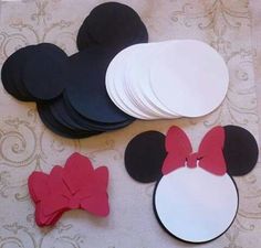 mickey mouse ears and other decorations on a table