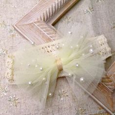 Stretchy Ivory Baby Headband with Mesh Bow and Pearls Introduce your little one to the world with grace and style with our exquisite Ivory Baby Headband. This delicate headband features a charming mesh bow adorned with elegant pearls, perfect for baptisms, christenings, and any special occasion. Average size: lay flat circumference of about 38cm, can be stretched to 50cm stretchy, not strangling the head. Suitable for 0-3 years old baby. Key Features: Elegant Mesh Bow: The headband showcases a b Cute Adjustable Headband For Wedding, Cute Adjustable Headband For Weddings, Cream Baptism Headband Hair Accessory, Cream Headband For Baptism, Cream Hair Accessories With Matching Headband For Baptism, Adjustable Cream Headband, White Headband For First Birthday, Elegant Adjustable Hair Accessories For Baptism, Elegant Adjustable Headband For Baptism