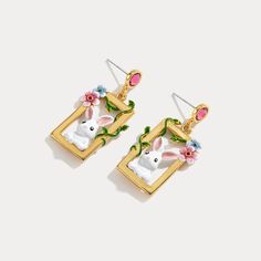 Crafted from the finest materials, these Garden Rabbit Earrings will bring luxe sophistication to any ensemble. Imbued with delicate detail, these precious trinkets feature an intricate design that captures a classic elegance and charm. An exquisite accessory for any stylish occasion, they are the perfect way to add artistry and refinement to your look. DETAILS Plating: 18K Gold Materials: 18K Gold on Brass, Enamel, Cubic Zirconia, Silver Size: 1.4"*0.79(36mm*20mm) Weight: 5.4g/pr American Shorthair Cat, Rabbit Earrings, Peach Earrings, Strawberry Flower, Unique Gift Wrapping, Cat Ring, Bee Necklace, Bee Earrings, Nature Garden