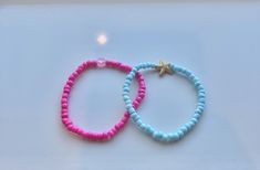 pink and blue bracelet duo, very durable and stretchy! Flexible Blue Summer Bracelet, Blue Flexible Casual Bracelet, Casual Blue Flexible Bracelets, Casual Flexible Blue Bracelets, Diy Jewelry Unique, Jewelry Unique, Blue Bracelet, Arm Band, Diy Jewelry