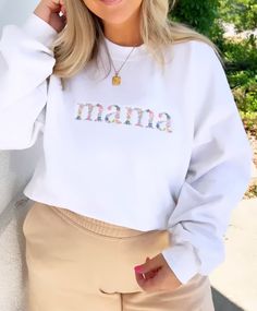 This dainty and pretty floral embroidered crewneck will be moms new favorite! *Floral design is around 8 inches on shirt. Mama Crewneck Sweatshirt, United Monograms, Mama Crewneck, Long Sleeve Baseball Tee, Matching Sets Outfit, Comfort Colors Sweatshirt, Sweat Set, Fall Denim, Long Sleeve Kids