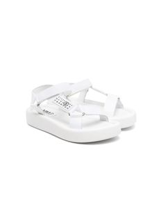 white calf leather matte finish grosgrain ribbon trim signature numbers motif single toe strap front touch-strap fastening branded leather footbed round open toe flatform rubber sole White Synthetic Sport Sandals With Flat Heel, White Synthetic Flat Heel Sport Sandals, Leather Sandals With Logo Strap For Spring, Spring Leather Sandals With Logo Strap, White Flat Synthetic Slingback Sandals, White Leather Platform Slingback Sandals, White Flat Platform Sport Sandals, White Studded Open Toe Sandals, White Slingback Sandals With Cushioned Flat Heel