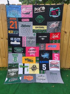 a quilt made to look like it has many different logos on it