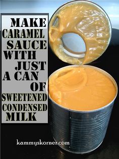 an open can of caramel sauce sitting on top of a table next to a spoon