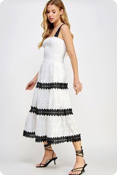 Lace trimmed long dress in embroidered eyelet lace fabric. This style features a smocked fitted bodice, contrast color scallop lace trim at skirt/straps, side pockets and adjustable straps. -lined -lightweight Fabric Contents - 100% polyester -Hand wash, dry flat -Colors may vary from different viewing devices. Spring Smocked Dress With Lace Trim, Fitted Smocked Dress With Lace Trim For Summer, Sleeveless Smocked Dress With Lace Trim For Spring, Elegant Fitted Smocked Dress With Lace Trim, Spring Dresses With Contrast Lace Detail, Fitted Tiered Lace Dress With Lace Trim, Elegant Smocked Dress With Lace Trim For Spring, Spaghetti Strap Dress With Lace Trim For Daywear, Spring Lace Dress With Contrast Lace