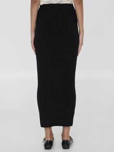 Pencil skirt in black ribbed wool and cashmere knit blend. Regular fit. Size nationality: USComposition: 65% Wool, 28% Cashmere, 6% Polyamide, 1% Elastane Elegant Ribbed Skirt For Workwear, Elegant Ribbed Skirt For Work, Chic Ribbed Skirt For Work, Elegant Black Ribbed Bottoms, Workwear Ribbed Pencil Skirt, Spring Workwear Ribbed Skirt, Spring Ribbed Workwear Skirt, Ribbed Pencil Skirt For Workwear, Ribbed Pencil Skirt For Work