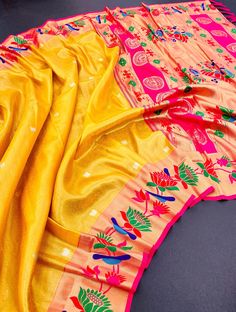 We're launching our premium tissue Paithani for the first time. It's made of soft Banarasi tissue Lotus Paithani fabric that drapes beautifully. The grand, rich Lotus Paithani pallu and Lotus border add to its beauty. Luxury Yellow Paithani Silk Dupatta, Luxury Gold Paithani Silk Traditional Wear, Paithani Silk Saree, Silk Saree, Silk Sarees, Lotus, First Time, The First, Product Launch