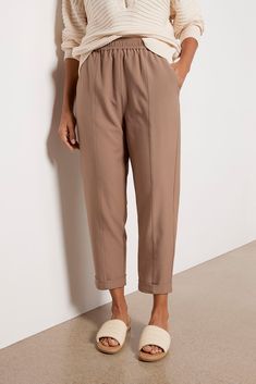 Step up your weekend style with the Cypress Turnup Taper Pant from Varley, featuring a high-rise fit, an elastic waistband with an adjustable drawstring, and an ankle length hem with a cuff. Taper Pants, Cuff Pants, Brand Style Guide, Fashion 101, Weekend Style, Tapered Pants, Spring Trends, Fall Shopping, Tee Dress