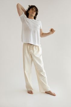 A cozy cotton drawstring pant that can be dressed up or down for every day of the week. Much like your boyfriend's pants, this style is intended to fit oversized. We recommend sizing down for a less oversized look. Inspired by vintage men's workwear, this durable fabric is speckled, and features tonal embroidery, and a hidden pocket on the inside. Orseund Iris offers a 7-day exchange & return policy for all items except for final sale pieces. Comfortable Cotton Pants With Straight Hem, Everyday Wide Leg Drawstring Pants, Everyday Wide Leg Pants With Drawstring, Organic Cotton Lounge Pants With Pockets, Relaxed Cotton Pants With Elastic Waistband, Comfortable Cotton Wide Leg Pants, Comfortable Cotton Wide Leg Pants For Fall, Comfortable Cotton Wide Leg Trousers, Relaxed Cotton Sweatpants Straight Leg