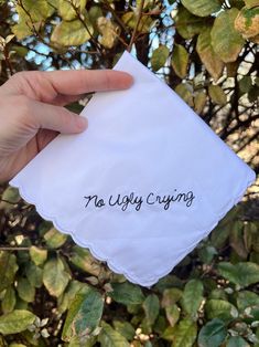 a hand holding a napkin with the words for happy jeans on it