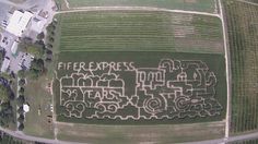 an aerial view of a field with a tractor drawn on it