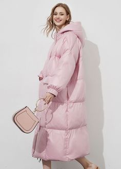 Stay warm and cozy in style this winter with this thick, hooded, pink women's puffer jacket. Fluff yourself up and stay fabulously fashionable - no matter how cold it gets! Fixed hood Lined, with 90% 600-fill-power down, 10% feather fill Polyester Front zip closure with snap storm flap Elastic cuffs Women's winter coat Machine wash, tumble dry Item #310241 Size info XS=US2=UK6=EU32 S=US4-6=UK8-10=EU34-36 M=US8-10=UK12-14=EU38-40 L=US12=UK16=EU42 ★★ It would be helpful if you provided your height Pink Long Coat, Women's Winter Coat, Women's Puffer Coats, Langer Mantel, Puffer Jacket Women, Soft Summer, Down Feather, Winter Coats Women, Puffer Coat