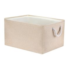 a beige storage box with rope handles on the front and bottom, sitting against a white background