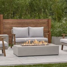 a fire pit sitting on top of a patio