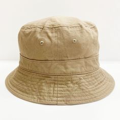 100% Cotton One Size fits all Trendy Solid Color Bucket Hat For Outdoors, Khaki Brimmed Cotton Bucket Hat, Khaki Cotton Bucket Hat With Curved Brim, Everyday Cotton Sun Hat, Solid Color Cotton Sun Hat For Everyday, Solid Cotton Sun Hat For Everyday, Khaki Cotton Bucket Hat For The Beach, Cotton Sun Hat For Everyday Use, Khaki Cotton Wide Brim Bucket Hat