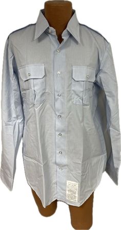 U.S. Air Force Issue Long Sleeve Dress Shirt Current Issue - USAF Shade 1550 Size: 17 x 38 (17 inch neck and 38 inch sleeve length) Condition: New Light Blue Long Sleeve Shirt For Semi-formal Occasions, Fitted Light Blue Shirt With Pockets, Fitted Shirt With Pockets And Casual Collar, Light Blue Fitted Shirt With Pockets, Business Blue Shirt With Pockets, Blue Business Shirt With Pockets, Fitted Business Shirt With Pockets, Fitted Button-up Dress Shirt With Pockets, Fitted Office Shirt With Pockets