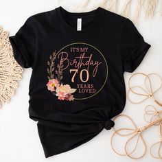 a black t - shirt that says it's my birthday 70 years loved