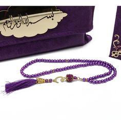 Holy Quran in Velvet Gift Bag with Prayer Beads - Purple What an incredible way to present the Holy Quran! A beautiful and luxurious velvet gift bag featuring an acrylic cutout on top that says "Bismillah" in intricate Arabic calligraphy. Comes with the Quran and prayer beads, as pictured. Perfect addition to your home, or great gift for friends and family! Quran: - Features acrylic cutout on top that says "Allah" in intricate Arabic calligraphy - Arabic script with Turkish explanations/chapter Acrylic Cutout, Calligraphy Arabic, Arabic Script, The Quran, Ramadan Gifts, Islamic Gifts, Holy Quran, Velvet Bag, Prayer Beads