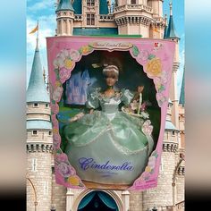 there is a barbie doll that is on display in front of the castle at disney world